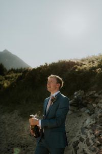 groom poping champagne cork